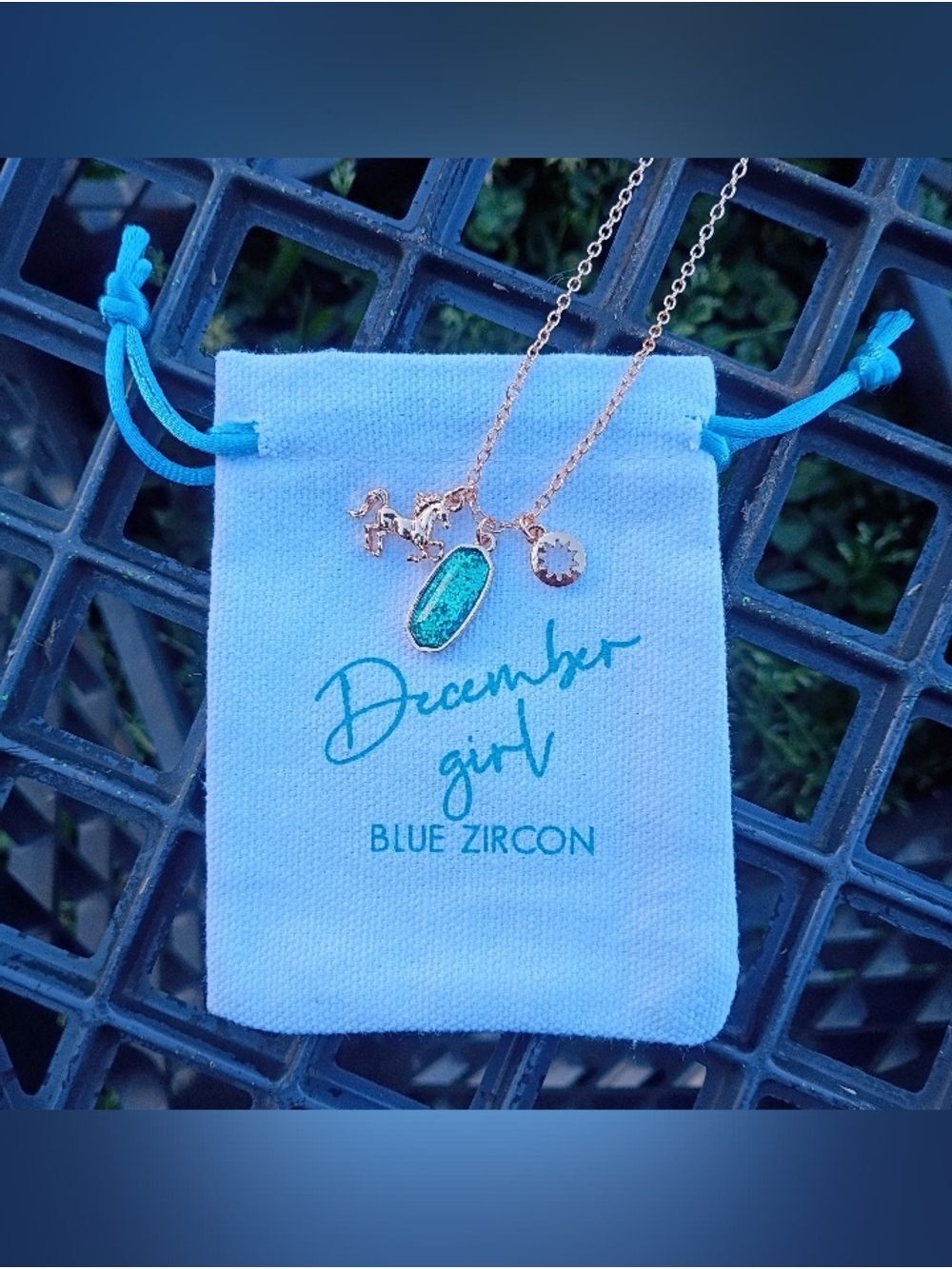 2/$10 December Girl Gold-Tone Necklace with Teal Glitter Pendant and Horse Charm - Picture 5 of 8